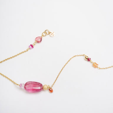 Bronzewing Bracelet 3 features an 18ct yellow gold chain with smooth pink tourmaline and colorful gemstone accents.