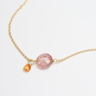 Strawberry Quartz Coin bracelet in 18ct yellow gold, featuring an orange sapphire drop charm.