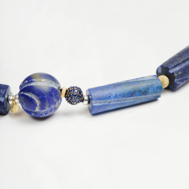 Bold Hippie Trail Bracelet featuring a mix of vintage lapis lazuli beads and sapphire set accents in blue tones.