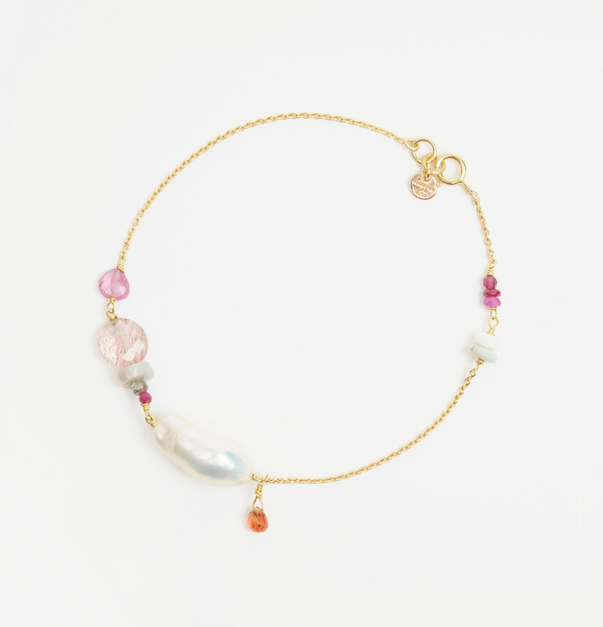 Bronzewing Bracelet 1 featuring a delicate gold chain adorned with freshwater baroque pearl, pink sapphire, and orange sapphire accents.