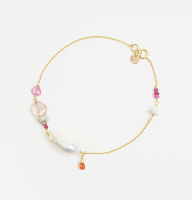 Bronzewing Bracelet 1 featuring a delicate gold chain adorned with freshwater baroque pearl, pink sapphire, and orange sapphire accents.