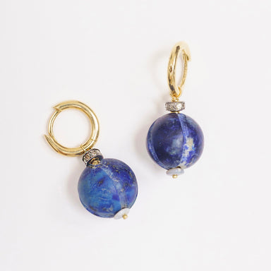 Gold hoop earrings featuring antique Lapis Lazuli beads, with sparkling diamond-set details and opal accents.