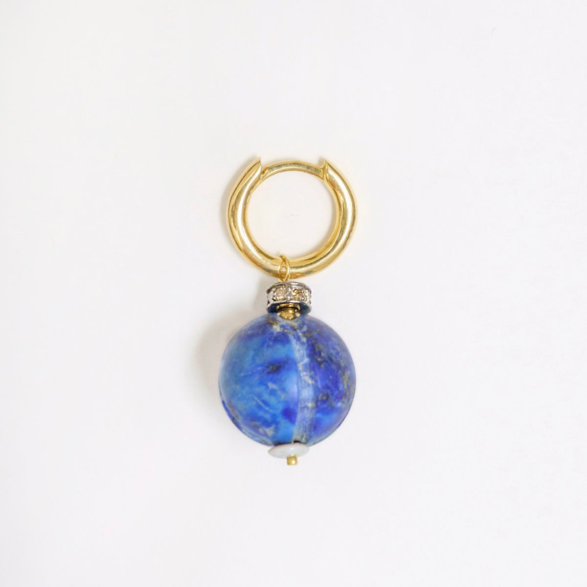 Gold hoop earring featuring a large antique Lapis Lazuli bead with a diamond-set rondelle and opal bead detail.