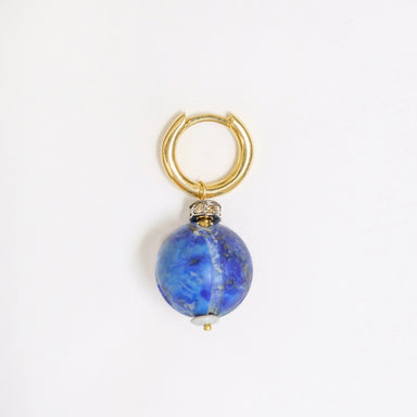 Gold hoop earring featuring a large antique Lapis Lazuli bead with a diamond-set rondelle and opal bead detail.