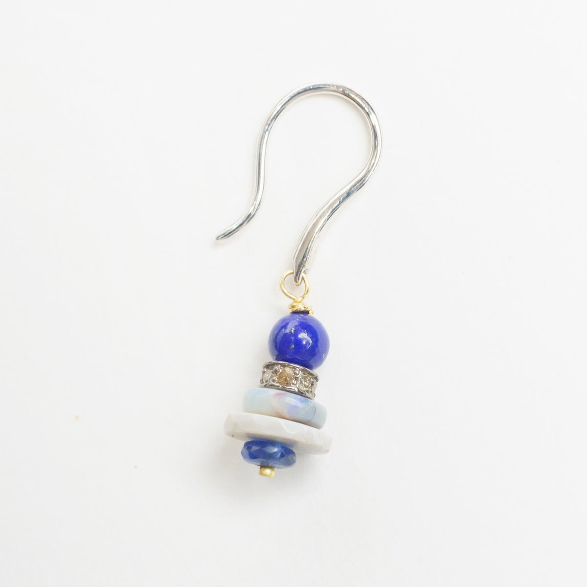 Cool-toned earrings featuring a stack of lapis lazuli, grey opal, blue sapphire, and diamond, set in 9ct white gold.