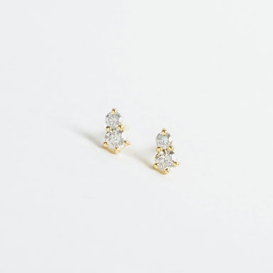 18ct yellow gold earrings featuring two sparkling silver diamond studs, measuring 2mm and 2.5mm.
