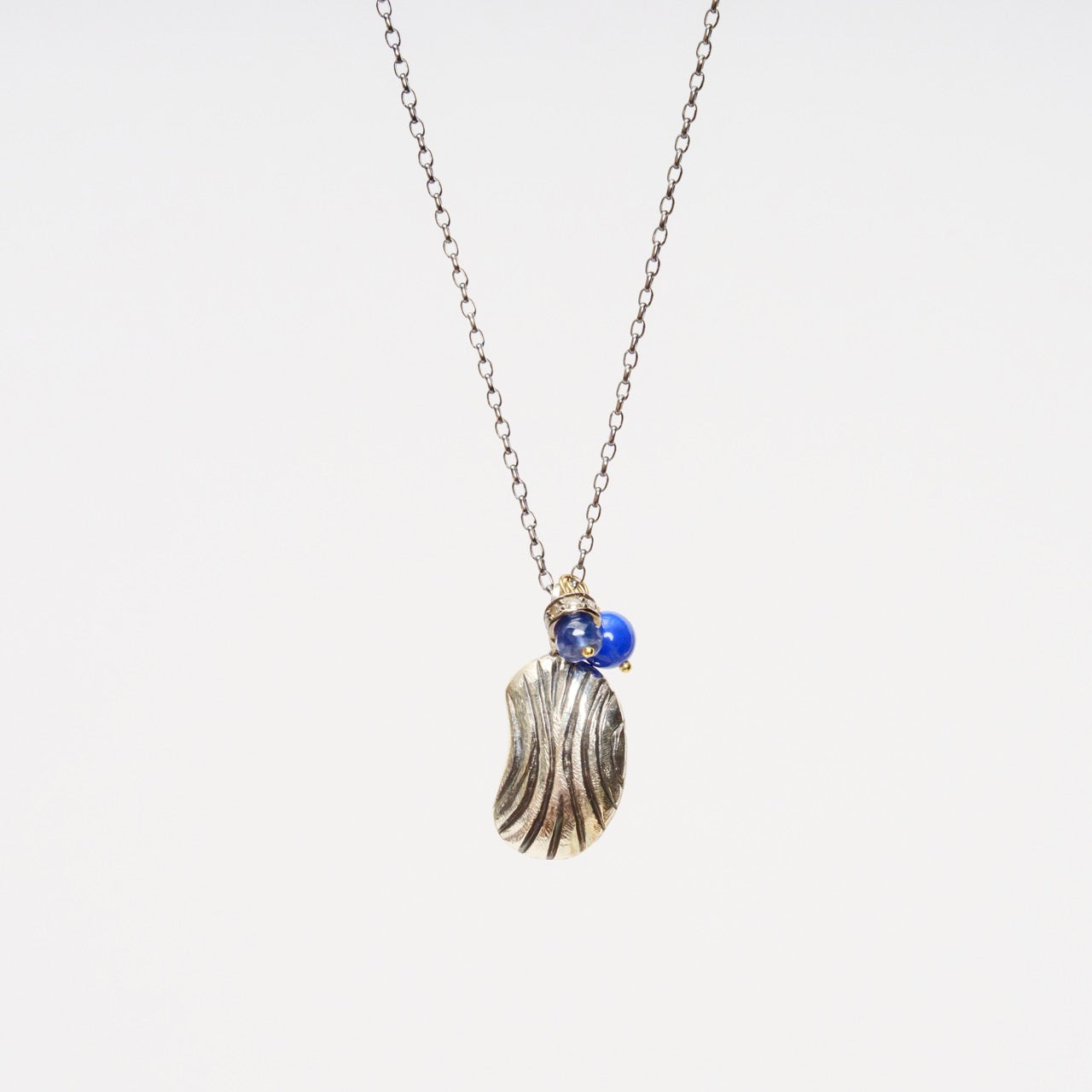 Carved Bean Pendant 2