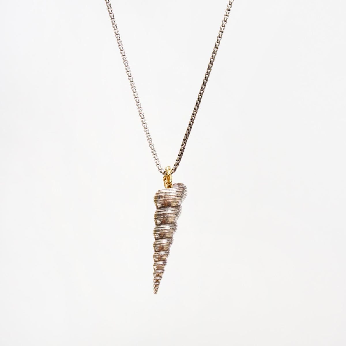 Large Larrakia Shell Pendant in solid silver, featuring a handmade 18ct yellow gold rope link on a slinky antiqued silver chain.